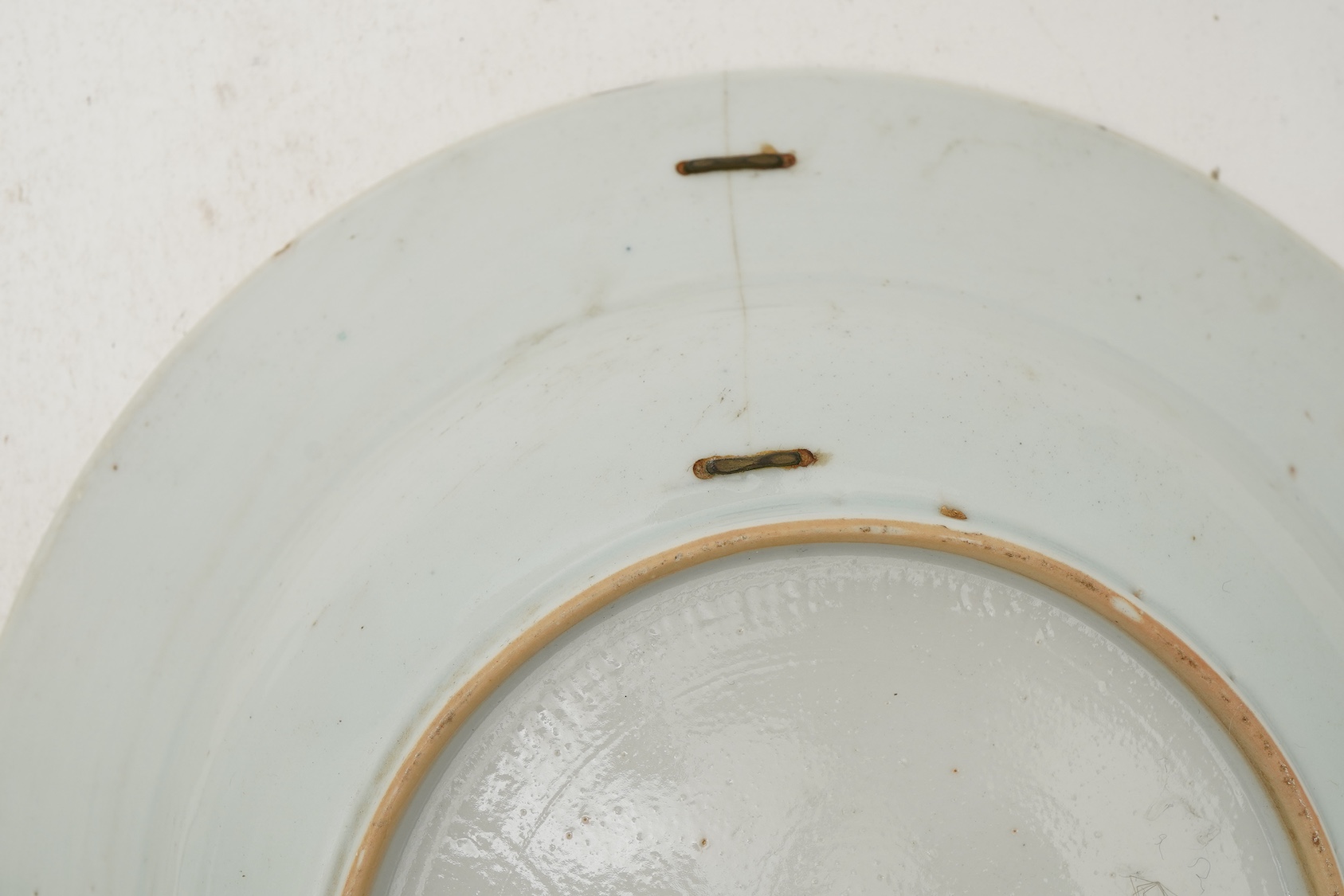 A pair of Chinese famille armorial plates, Qianlong, c.1750